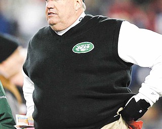 New York Jets head coach Rex Ryan watches his team play against the New England Patriots during the second half of an NFL divisional football playoff game in Foxborough, Mass., Sunday, Jan. 16, 2011. 