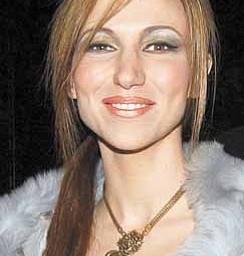 In this February 9, 2003 file photograph, Debbie Gibson attends the Luca Luca ready-to-wear Fall 2003 fashion show as part of the Mercedes-Benz fashion week in New York. Along with her role in the Syfy Network's "Mega Python vs. Gatoroid," Gibson is getting ready to mount a musical comeback this year.