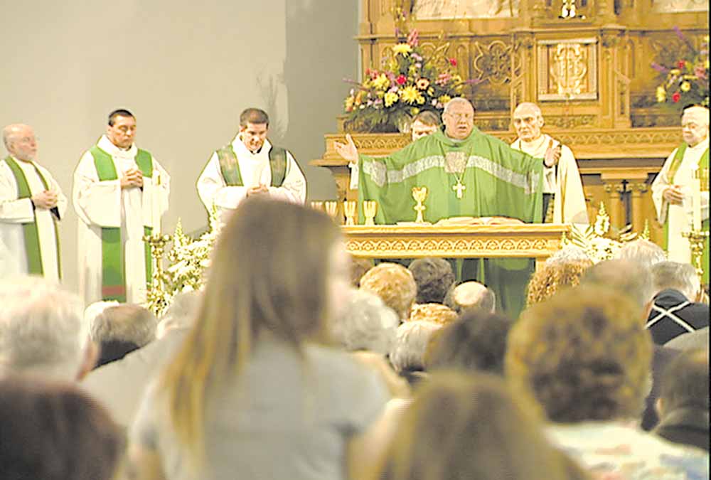 Bishop George V.  Murry delivers the final mass at Immaculate Conception Church in Youngstown.