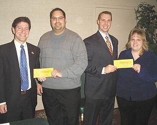 Gearing up for reverse raffle: Austintown Rotary Club will host its primary fundraiser, an evening of fine food, beverages and desserts, at 6:30 p.m. March 5 at the Maronite Center on Meridian Road, Youngstown. Those attending the event will have an opportunity to participate in a reverse raffle for a chance to win part of $2,000 in cash prizes. Tickets for the event are $150 per couple and include dinner for two, refreshments and a chance to win prizes. There also will be a mini board raffle; tickets are $25 each. Preparing for the sale of raffle tickets are, from left, Dr. Mitch Dalvin, Dr. Michael Cafaro, Brian Laraway and Melissa Crowley, Austintown Rotarians.