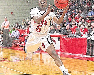 STRUTHERS - POLAND - Struthers' Ja'Meire Brown (5) makes a play on the ball Wednesday night.