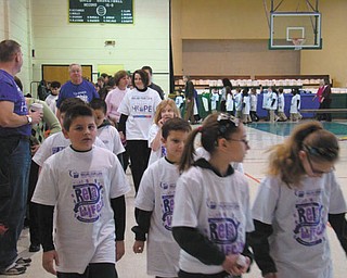 Walking to fight cancer: At St. Patrick School in Hubbard, students, faculty and families continued their tradition of helping others as they kicked off their annual Catholic Schools Week celebration this week. The school started the week with the annual Relay for Life for the American Cancer Society. The Ealy family coordinated this year’s event. The opening ceremonies speaker was Barbara Wheeler, grandmother of first-grader Jayden Johnston, who escorted her to the podium. Mrs. Wheeler is an 18-month cancer survivor. The school raised $1,120 for the American Cancer Society.