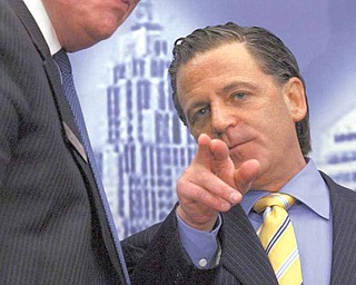 Quicken Loans founder and chair Dan Gilbert addresses the Detroit Economic Club, Thursday, March 11, 2010 in Detroit. Gilbert announced that his company Fathead will be joining Quicken Loans in the move downtown. (AP Photo/Detroit Free Press, Kathleen Galligan)