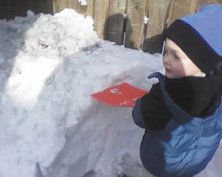 Timmy Kerr, 4, of Poland enjoys the weather. Photo sent in by Gary Kerr.