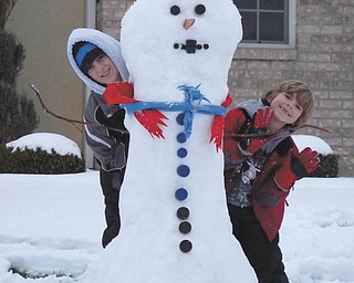 One more look at Ivan and Alec Bosnjak and their snowman. Photo sent in by their parents, Andrea and Ivan Bosnjak, all of Boardman.
