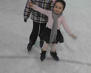 Alexandra Ramunno, front, and Alyssa Serensky pal around on the ice.