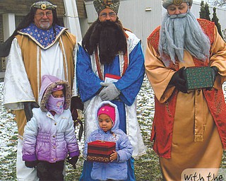 Nevaeh Rivers, left, and London Rose Rivera are with the kings at the "Journey to Bethlehem" event at Disciple Christian Church. Photo submitted by their grandmother, Aida Morales.