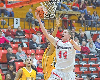 YSU's Vytas Sulskis floats past Valparaiso's Crusader Howard Little to score two points.