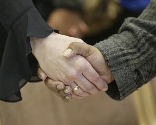 William D. Lewis the vindicator YSU students and facultyjoined hands during a Monday prayer service on campus for victims of a weekend shooting.