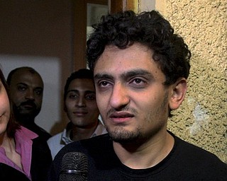 Egyptian Wael Ghonim, a Google Inc. marketing manager, talks at his home in Cairo, Egypt, Monday, Feb.7, 2011. A Google manager held in Egypt for about 10 days over anti-government protests was freed Monday. (AP Photo/Ahmed Ali)