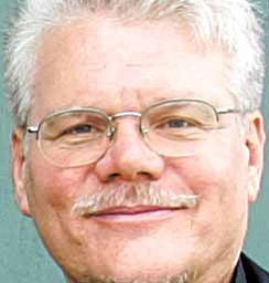 Abbot John of Henry of St. Herman's Monastary and House of Hospitality leaves a Dept. of Motor Vehicles bureau in Cleveland, Ohio, Aug. 16, 2007. Henry, 58, is under investigation after police and federal agents found 130 guns and boxes of ammunition Friday, Feb. 4, 2011, at a Trumbull county farm affiliated with the shelter, in addition to 80 guns and boxes of ammunition confiscated from Henry in January.