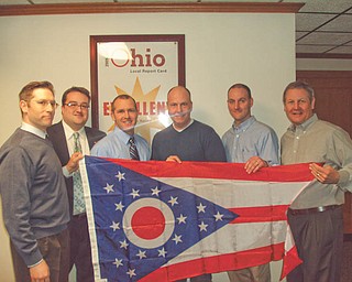 Receiving recognition: In honor of School Board Recognition Month, Columbiana County Recorder Craig Brown presented Salem City School Board members with an Ohio state flag. Pictured, from left, are Nick Bush, Brown, Steve Bailey, Brad Myers, Andrew Null and Jeff Cushman.