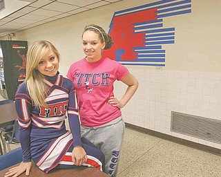 Joellin Chance and Elan Caruso, both officers for the junior class at Fitch High School, helped raise money Friday for an Austintown family whose son, Jesse Sellars, died last week. The money will be given to the family to help with funeral costs.