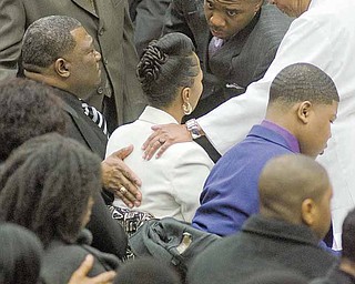 Mourners gather to offer their support to the family of Jamail Johnson Saturday morning at YSU's Beeghly Center. Johnson, a YSU senior, was killed in a shooting early February 6th at his residence north of the YSU campus. 11 people, including six YSU students, were wounded.