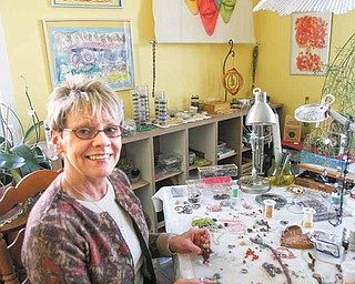 Artist Donna Bostardi works on her handcrafted jewelry at 29 Logan Ave., "A Little Gallery on the West Hill." The gallery, just west of downtown Sharon, is a mecca for handmade art deco, all made by the talented area artists.
