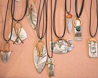 Pewter, copper and bronze are cleverly made into necklaces and jewelry by artist Donna Little of Sharon, an accomplished metal smith, at 29 Logan Ave., "A Little Gallery on the West Hill." The gallery, just west of downtown Sharon, is a mecca for handmade art deco, all made by the talented area artists.