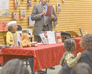 Youngstown Mayor Jay Williams reads a speech by then-Senator Barack Obama at the groundbreaking of the Dr. Martin Luther King Jr. National Memorial during the African American Read-In held by the Youngstown City Schools at Barnes & Noble Booksellers in Boardman.
