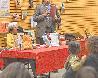 Youngstown Mayor Jay Williams reads a speech by then Senator Barack Obama at the groundbreaking of the Dr. Martin Luther King Jr. National Memorial during the African American Read-In held by the Youngstown City Schools at Barnes & Noble Booksellers in Boardman.