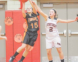 Newton Falls' Angela Giuliano (15) and Sadie Noling (2) battle for the ball Monday night in Struthers.