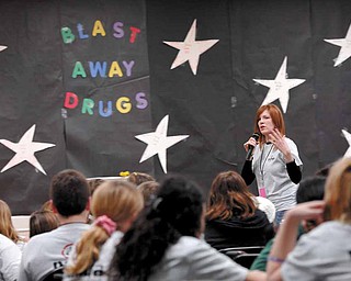 Meridian Community Care social worker, and PANDA club coordinator Beth Bonish talks to Boardman center Middle School students during a PANDA club lock-in. The lock-in was set up to discuss issues surrounding drug and alcohol use prevention as well as decision making techniques.