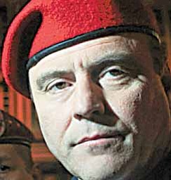Guardian Angels founder Curtis Sliwa reacts as he leaves federal court in Manhattan after jurors remained deadlock in the racketeering trial against John "Junior" Gotti in New York, Tuesday, Nov. 24, 2009. This is Gotti's fourth trial, the previous three declared mistrials, and each time prosecutors renew accusations that Gotti orchestrated a kidnapping and attempted murder plot against Sliwa.