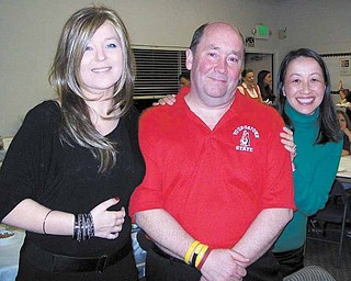Tom Lamb, of Boardman, center, traveled to California for a fundraiser to benefit Lea Allen, 28, left. Lamb, Allen and Kana Yang, right, all have epithelioid sarcoma and met one another through an online support group.