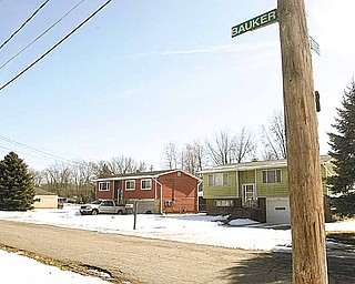 Some homes on Bauker Lane, the small East Side street where gunfire erupted last week leaving some longtime residents feeling trapped in their homes. Police are investigating, but have made no arrests in the shooting.