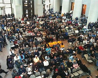 Hundreds of unionized firefighters, police officers, teachers and others overflowed a hearing room Tuesday, Feb. 15, 2011, at the Statehouse in Columbus, Ohio, where supporters testified on a proposal to end collective bargaining in Ohio. (AP Photo/The Dayton Daily News, Laura Bischoff)
