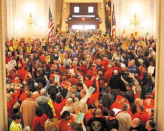 Hundreds of supporters for and against Senate Bill 5, fill the Ohio Statehouse rotunda Thursday, Feb 17, 2011, in Columbus, Ohio. (AP Photo/Terry Gilliam)