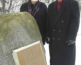 Shirley Eckley, vice-president and secretary of the William Holmes McGuffey Society, and a decedent of William Holmes McGuffey and Richard Scarsella stand hear a plaque at the William Homes McGuffey Wildlife preserve on McGuffey Road.