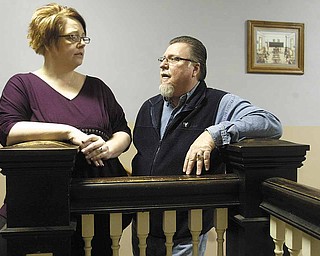 Charlene Crissman, administrator and part-owner of the House of Hope in Youngstown, talks with the Rev. Roy Barnett, executive director of the Ohio Valley Teen Challenge, at the House of Hope's Youngstown facility.