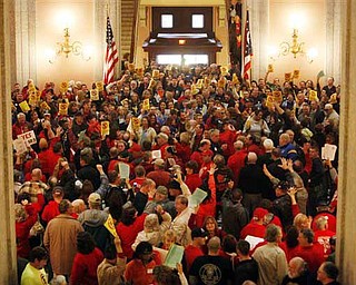 Hundreds of supporters for and against Senate Bill 5, fill the Ohio Statehouse rotunda Thursday, Feb 17, 2011, in Columbus, Ohio. (AP Photo/Terry Gilliam)