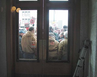 Demonstrators against Senate Bill 5 were locked out of the Statehouse on Tuesday.
