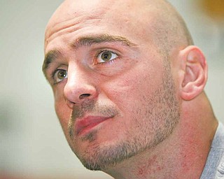 Boxer Kelly Pavlik talks to the media Tuesday at Jack Loews Southside Boxing Club.