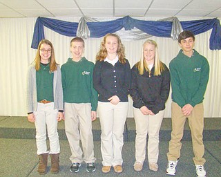 Scientific experience: Professionals in the field of science served as judges for a Science Fair, in which seventh- and eighth-grade students participated during Catholic Schools Week at St. Patrick School in Hubbard. Students were judged on the physical presentation of their projects and how well they answered questions the judges asked about their projects. Winning the competition were, from left, Madison Harris, fifth place; Justin Oaks, fourth place; Gabriella Hosack, third place; Katie Conlan, second place; and Bobby Dulay, first place. The students will advance to competition in the Youngstown State University Lake to River Science Day.