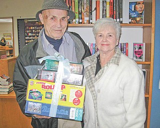 Jigsaw puzzles exchanged: Newton Falls Public Library, 204 S. Canal St., encouraged residents to take part in its annual Jigsaw Puzzle Exchange recently at the library. New or gently used jigsaw puzzles were taken to the library, then those donating puzzles later returned to the library to select “new to you” puzzles. The winner of a drawing at the exchange was George Chepke, above. He and his wife, Pat, picked up the three puzzles and puzzle mat he won at the event.