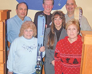 Skis the limit: The Warren Ski Club will present a beerfest and auction from 6:30 to 9:30 p.m. March 11 at McMenamy’s Restaurant, 325 Youngstown-Warren Road, Niles. Admission to the auction is free. Beer-tasting samples will be available for $10 from five Ohio microbrewers: Great Lakes, Rust Belt, Ohio, Thirsty Dog and Willoughby Brewers. There also will be a cash bar. Part of the proceeds will benefit Three Trackers of Ohio, an all-volunteer group that promotes adaptive recreational sports for those with physical disabilities. For more information visit www.warrenskiclub.org. Some members of the auction committee are, in front, from left, Nancy Iezzi Dom, Mary Kirila and Gigi Ferris, and, in back, Bob Shimek, club president; Jack Kumik; and Joe Nardella.