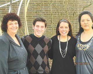 From left to right are Carla Infante, president of the Youngstown Opera Guild; Neil Meloro and Kayla Wilson, vocal students at Youngstown State University; and Dr. Misook Yun, vocal professor at YSU. The guild’s scholarship luncheon will be March 5.
