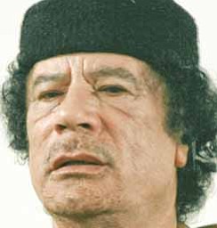Libya's Moammar Gadhafi talks during a debate on the sidelines of celebrations marking the 30-year anniversary of the declaration of the "jamahiriya," or "rule of the masses, in Sabha, Libya Friday, March 2, 2007. Gadhafi said in an unusual debate Friday it was time for his long-isolated nation to open up to the world and that one day it won't need him as leader. Still, he touted the ruling ideology he has entrenched here for three decades as superior to Western democracy.