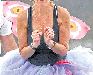 Jan Jordan of Massillon isn't too sure about making the jump into the freezing water and getting her nymph costume wet during the Portage Lakes Polar Bear Club 's 8th annual Polar Bear Jump at Portage Lakes State Park on Saturday, Feb. 26, 2011, in New Franklin, Ohio. The event, which has raised over $160,000 in the last 7 years for local charities, had over 200 jumpers and will benefit the Akron Canton Foodbank this year.