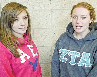 YSU students Courtney Gobel, left, and Lesley Anne Roddy recently participated in a breast cancer study in which they donated blood and breast tissue.