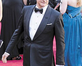 Actor Colin Firth arrives before the 83rd Academy Awards on Sunday, Feb. 27, 2011, in the Hollywood section of Los Angeles.