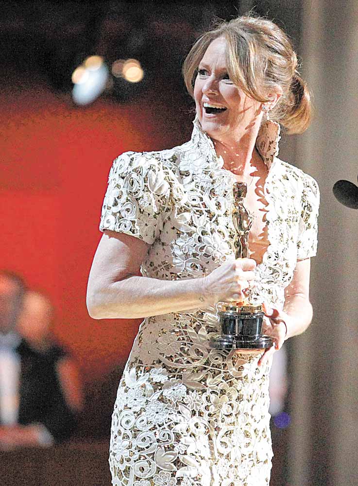 Actress Melissa Leo accepts the Oscar for best actress in a supporting role for "The Fighter" at the 83rd Academy Awards on Sunday, Feb. 27, 2011, in the Hollywood section of Los Angeles. 
