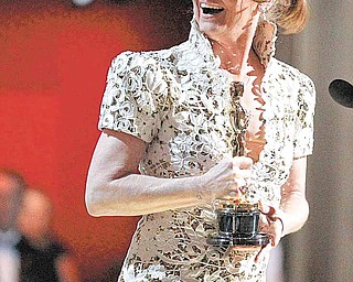 Actress Melissa Leo accepts the Oscar for best actress in a supporting role for "The Fighter" at the 83rd Academy Awards on Sunday, Feb. 27, 2011, in the Hollywood section of Los Angeles.