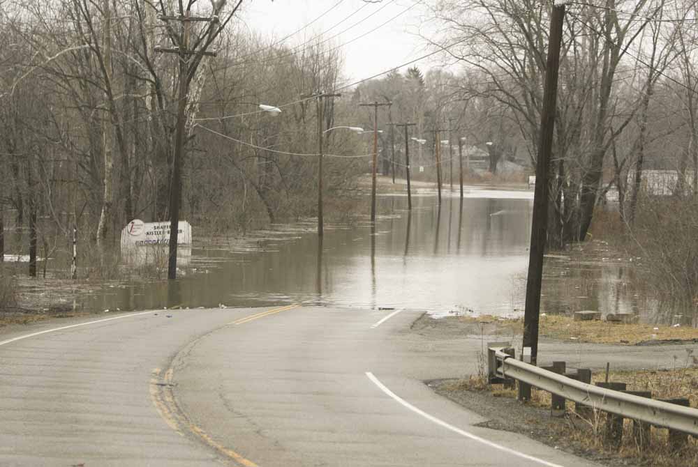 Flooding on state Route 46 and McKees Lane in Weathersfield Township in Trumbull County caused the road to be closed to traffic for several hours Monday.
