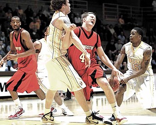 Youngstown State's forward Vytas Sulskis (#44) runs into Valparaiso Crusaders forward Kevin Van Wijk (#55) during the game Tuesday night at the Athletics and Recreation Center, Valparaiso, Indiana as the Valparaiso Crusaders hosted the Horizon League Tournament against Youngstown State.