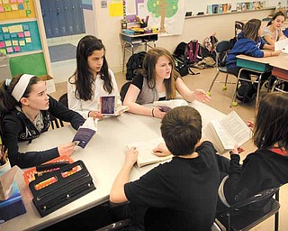 At McKinley Elementary in Poland, Eva Sullivan’s sixth-grade students meet in groups where they are given a choice of what to read and discuss among peers. Sullivan said the practice increases the number of books students read each year.