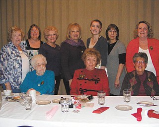 Youngstown Charter Chapter of ABWA presented a scholarship at its Feb. 15 meeting. In the back row, from left, are Treasurer Mary Ann Rushton; President Cathy Pokrivnak; Secretary Sue Morell; Patti Mika; scholarship winner Katelyn Gould; her mother, Mary Gould; and Patti Coogan. In the front row, from left, are June Balint, Jean Backman and Mary Lou Lewis. Members not pictured are Vice President Beth Stanko and Peg Broadwater.