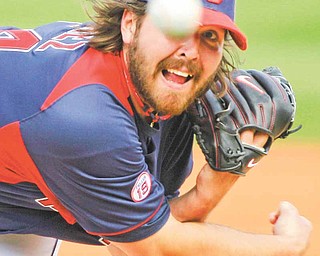 The Cleveland Indians pitcher Chris Perez brings the heat against the Los Angeles Dodgers in the third inning of an exhibition baseball game Tuesday in Goodyear, Ariz.