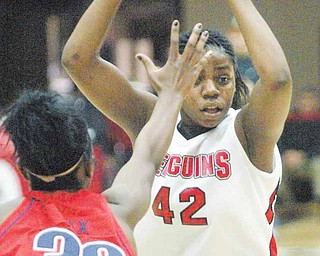 YSU's Brandi Brown gets past UIC's Cree Nix during first half action Thursday.